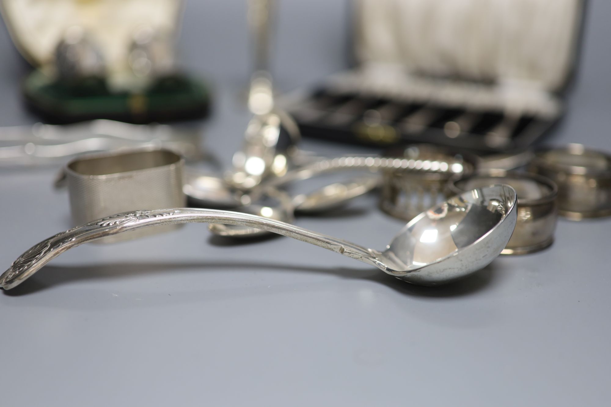 Various silver spoons etc.